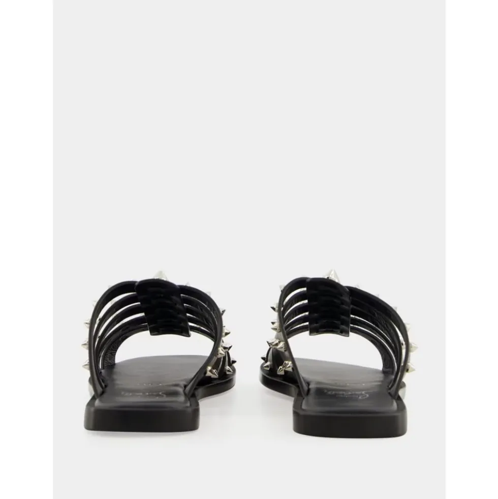 Charja Flat Mules med Nitter