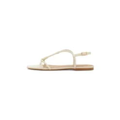 Minimalistiske sandaler på en flad sål