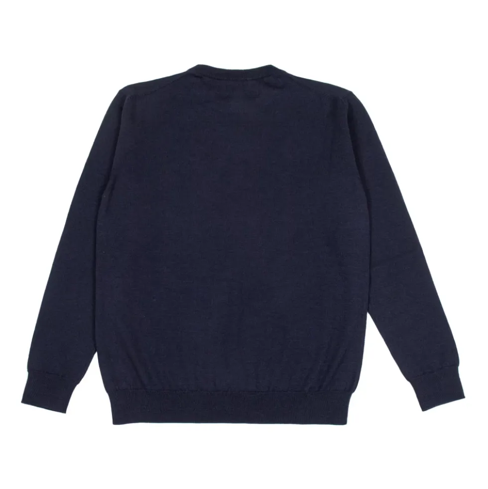 Plain-strikket uldsweater med broderi