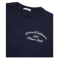Plain-strikket uldsweater med broderi