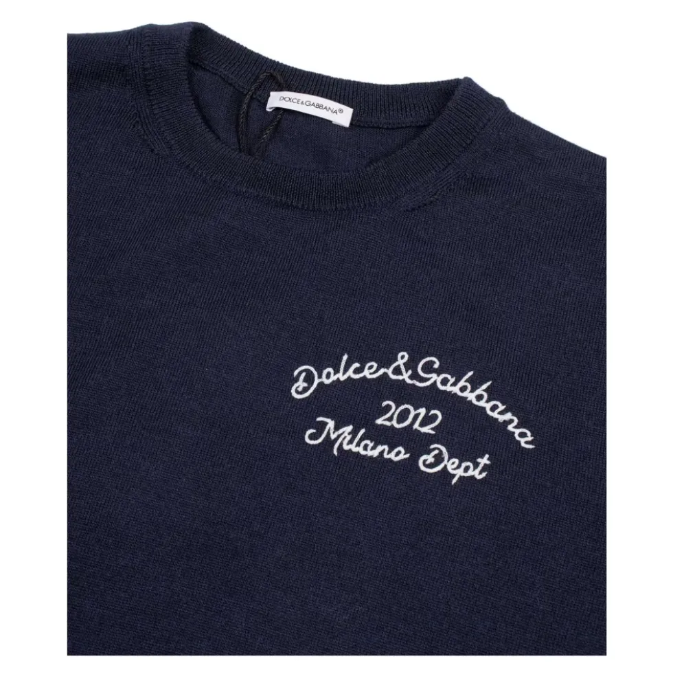 Plain-strikket uldsweater med broderi